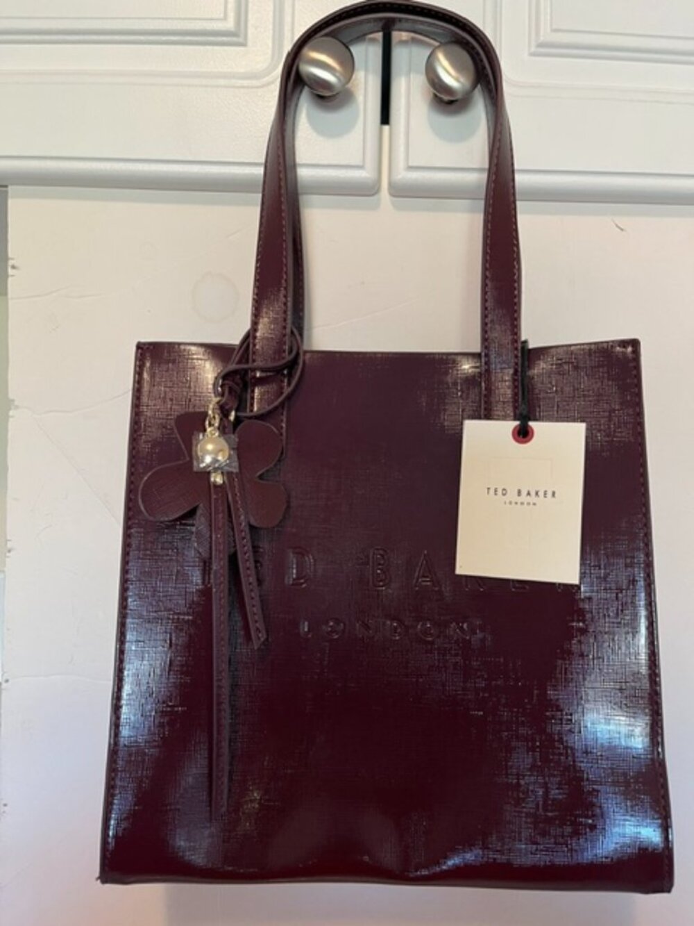 Ted Baker London burgundy ICON tote bag.
